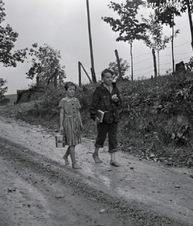 Two kids walking barefoot to school, Claiborne County, Tennessee, 1940 https:...