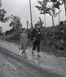 Two kids walking barefoot to school, Claiborne County, Tennessee, 1940 https:...